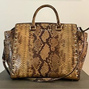 Leather with snake skin look bag.  Used in great condition